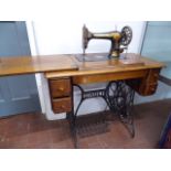 Victorian oak and cast iron singer treadle sewing machine