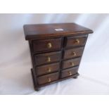 Mahogany shell motif miniature 8 drawer chest ( 13" tall )