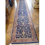 Blue ground Persian runner (146" x 29")