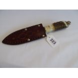 Antler handled Dirk dagger with jewelled finial in leather sheath (10" length)