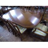 Regency style mahogany dining table and 6 chairs
