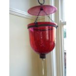 19thC Cranberry glass hanging bell jar lantern suspended on 3 chain hooks with pheasants head