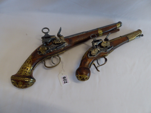 Brass mounted replica flintlock pistols (2)