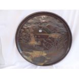 Carved wooden lacquered circular tray depicting kingfishers diving in Chinese landscape (27"