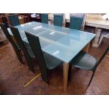 Modern extending frosted glass top dining table with set of 8 high back green leather chairs - Quia,