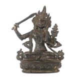 Manjushri Tibet, 19./20. Jh., Bronze, in vajrasana auf Lotussockel sitzend, in der linken Hand ein