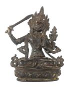 Manjushri Tibet, 19./20. Jh., Bronze, in vajrasana auf Lotussockel sitzend, in der linken Hand ein