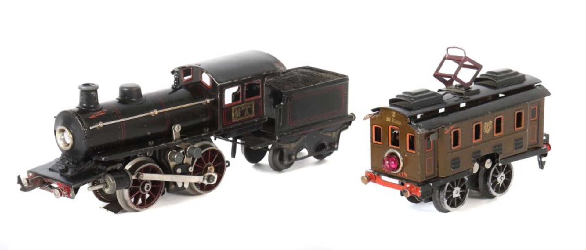 2 Loks Märklin, Spur 0, 1 x 20-Volt-Dampflok m. Tender 0/35, R 13040, schwarz CL, BZ 1926-31, ohne