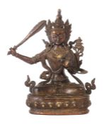 Manjushri Tibet, 19./20. Jh., Bronze, in vajrasana sitzende Gottheit auf Lotussockel, die linke