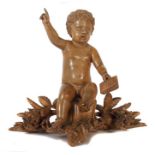 Bildschnitzer des 19. Jh. "Putto", Holz geschnitzt, vollplastische Figur eines Knabens mit Buch in