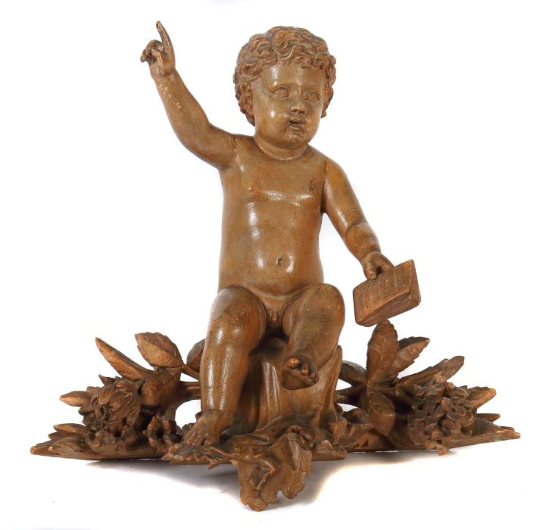 Bildschnitzer des 19. Jh. "Putto", Holz geschnitzt, vollplastische Figur eines Knabens mit Buch in