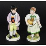 ''PAIR OF CHILDREN Neu-Ludwigsburg Two colourfully decorated porcelain figures. Maker's