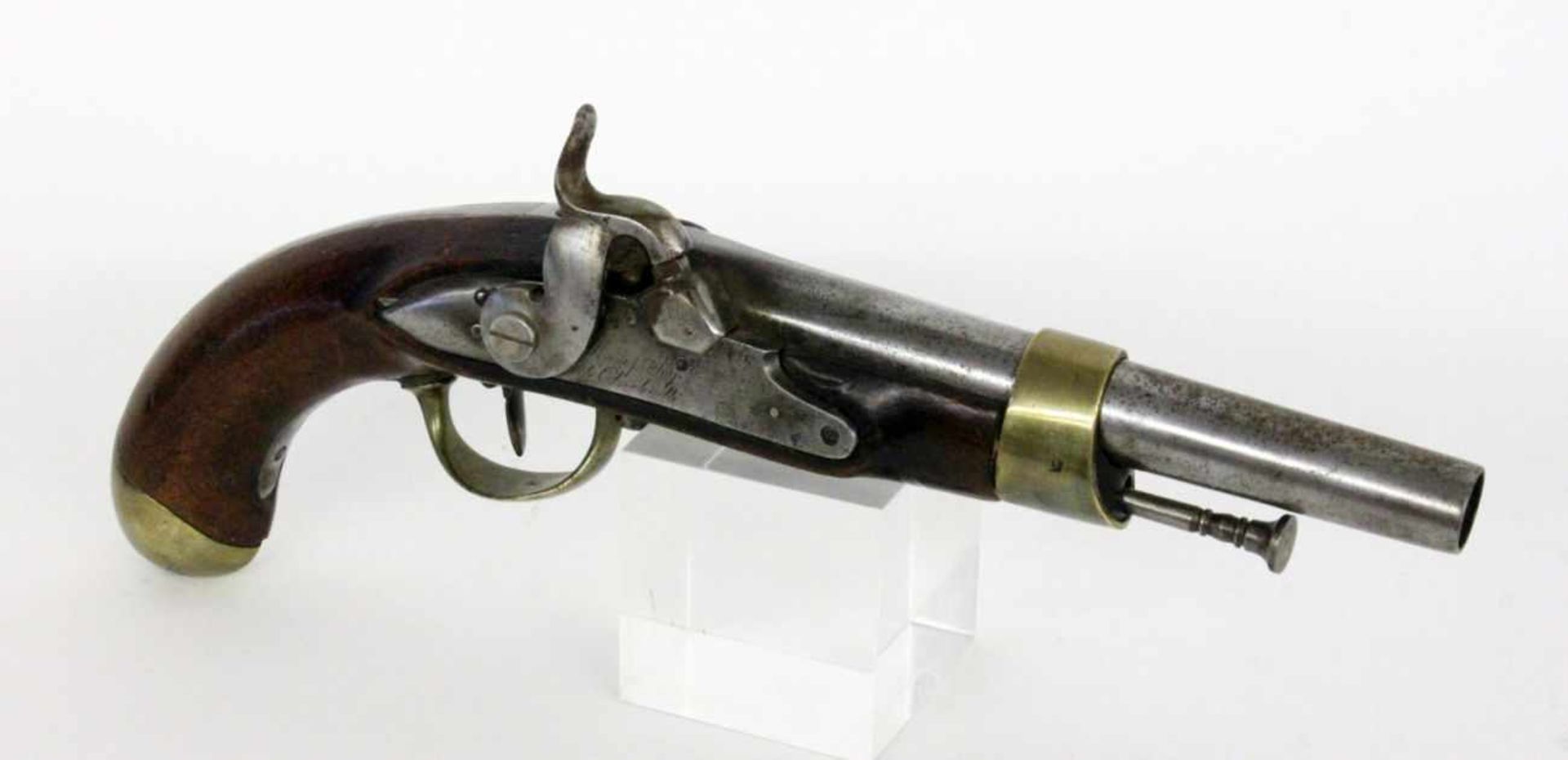 ''A FRENCH PERCUSSION PISTOL circa 1825 Round iron barrel, walnut stock with brass