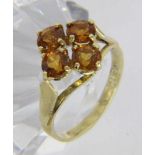 ''A LADIES RING 585/000 yellow gold with 4 Madeira citrines. Ring size 55, gross weight