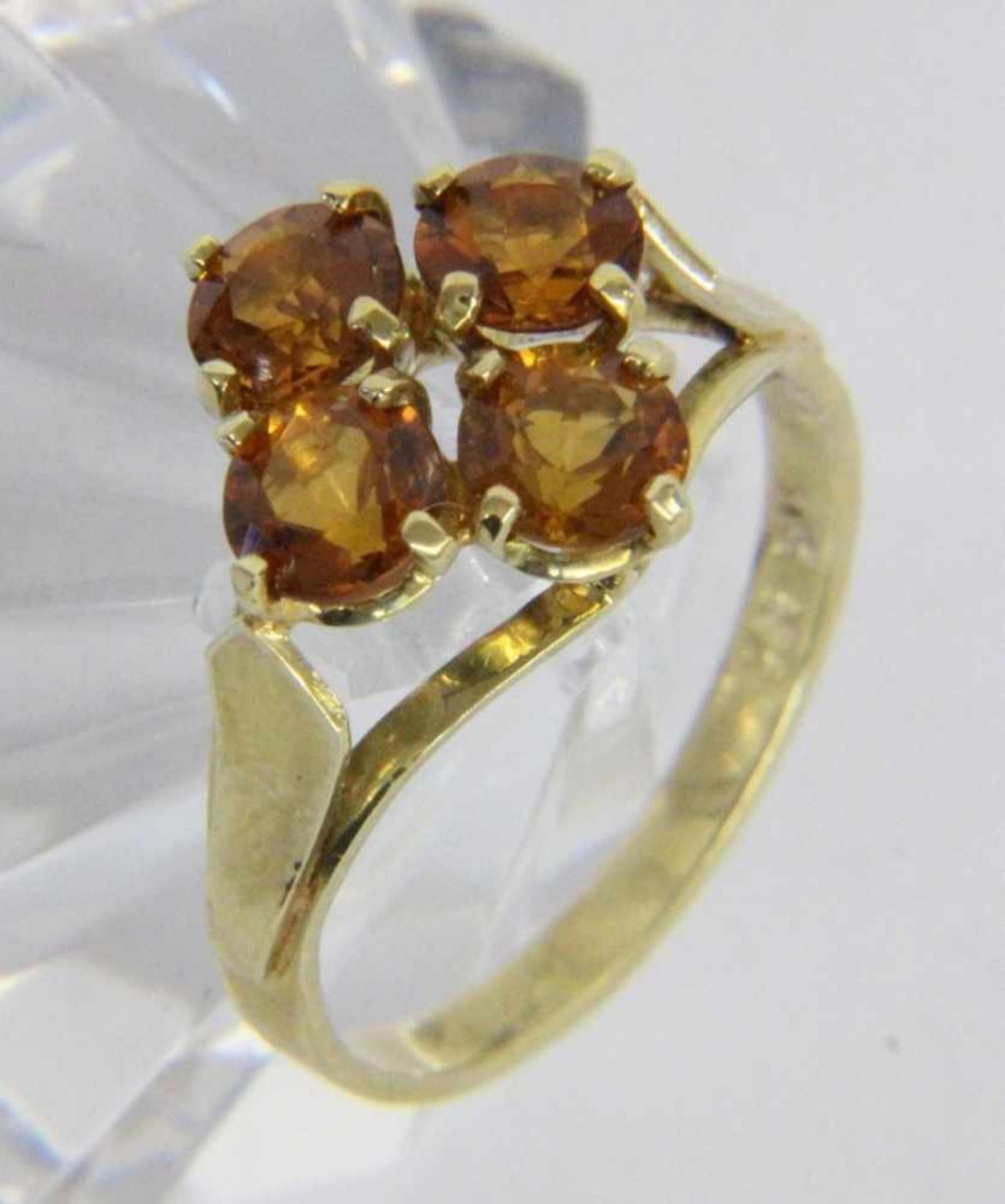 ''A LADIES RING 585/000 yellow gold with 4 Madeira citrines. Ring size 55, gross weight