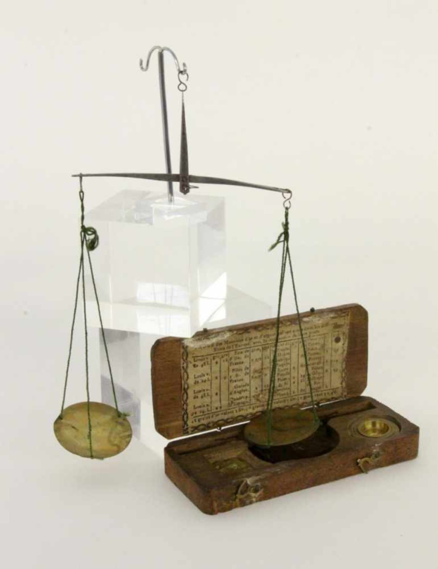 AN OLD COIN SCALE France, 18th/19th century Iron with 2 brass trays and weights. Case made