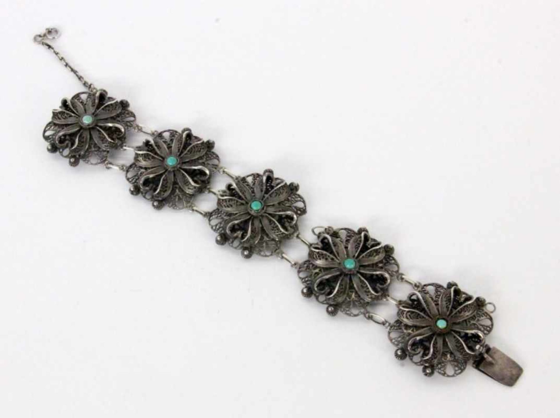 ''A COSTUME BRACELET Silver with turquoises. 18.5 cm long, gross weight approx. 47 grams.