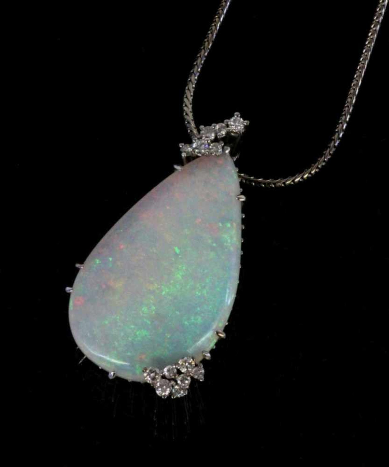 ''AN OPAL PENDANT A precious opal of exceptional size, approximately 40ct, approx. 34 x 20