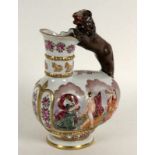 A TANKARD WITH HANDLE Italy, 20th century Colourfully painted porcelain with figural