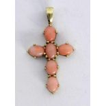 ''A CROSS PENDANT 585/000 yellow gold with angel skin coral. 4 cm long, gross weight