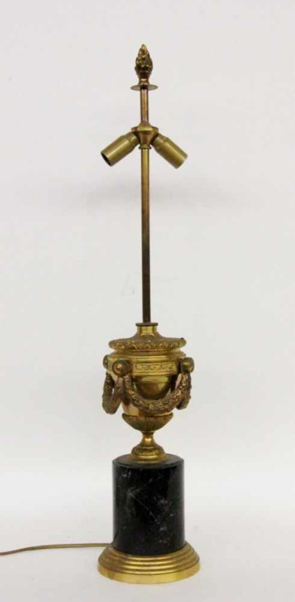 AN EMPIRE LAMP STAND France, 20th century Vase-shaped body with sculptural garlands of