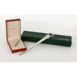 ''A DUPONT TIE CLIP and silver letter opener. In original cases.Keywords: miscellaneous ''