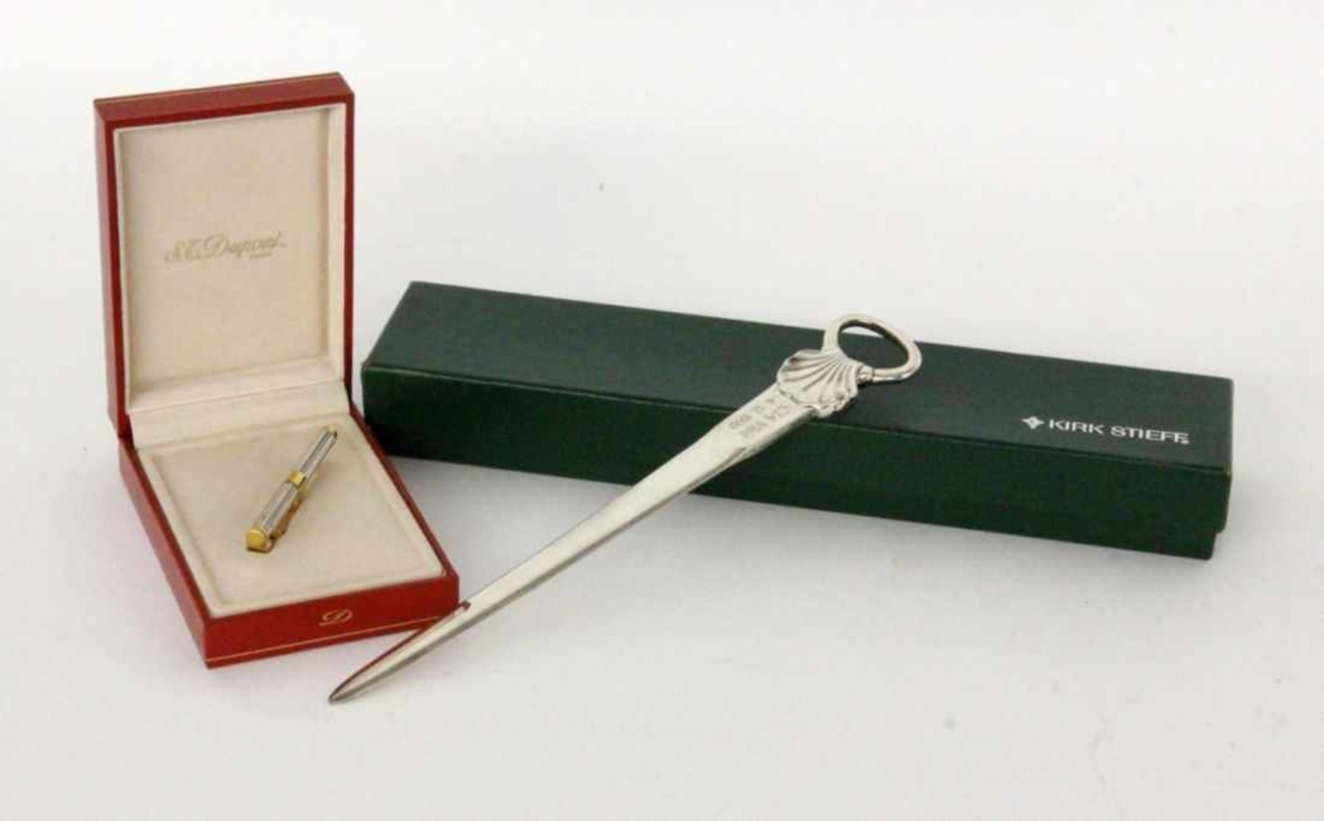 ''A DUPONT TIE CLIP and silver letter opener. In original cases.Keywords: miscellaneous ''