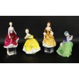 ''4 ROYAL DOULTON PORCELAIN FIGURES, colourfully painted. Approx. 20 cm highKeywords: