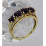 ''A LADIES RING 585/000 yellow gold with 4 amethysts. Ring size 54, gross weight approx.