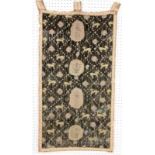 ''A WALL HANGING WITH RELIGIOUS MOTIFS Velvet fabric with gold brocade. 118 x 65