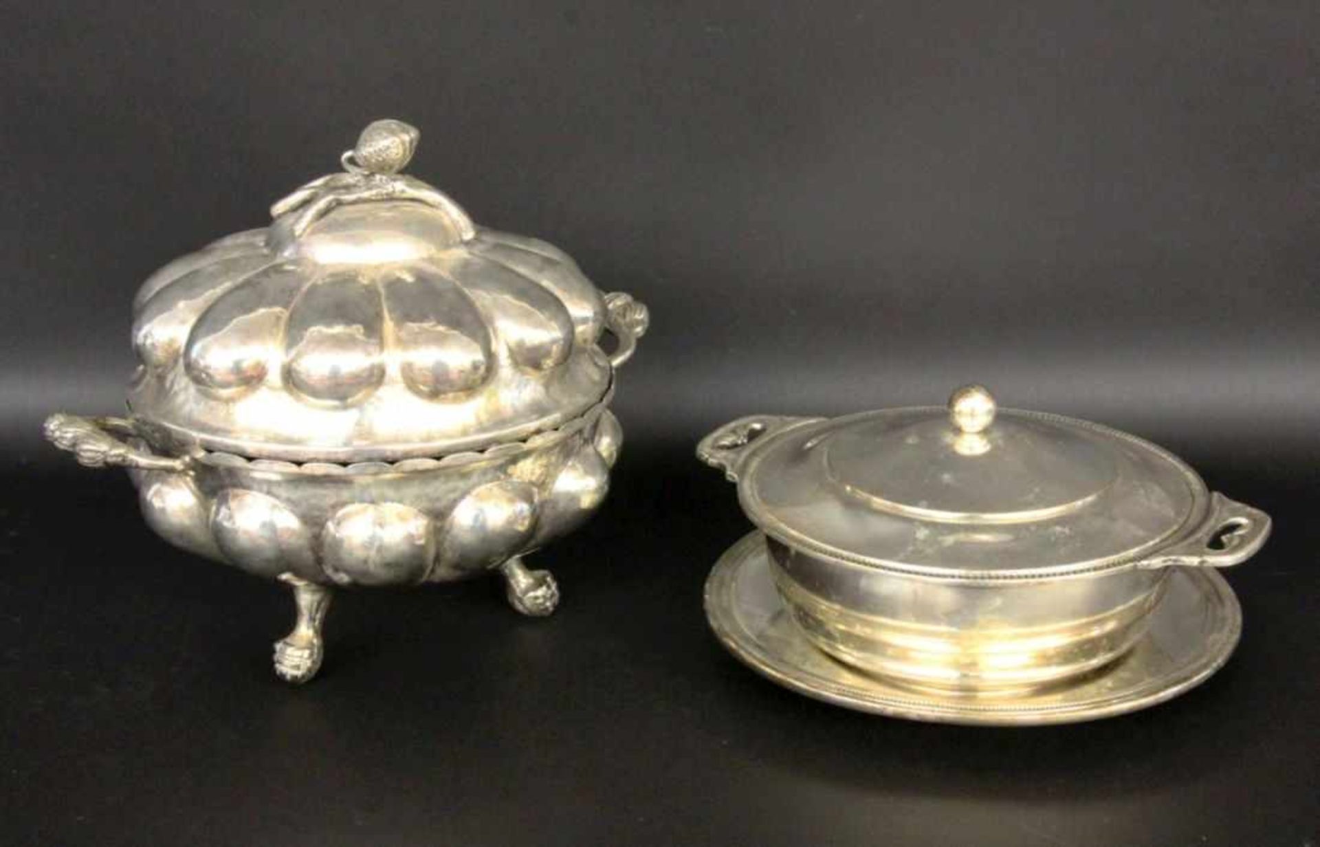 ''A SOUP AND A VEGETABLE TUREEN WITH PLATE, silver-plated metal. Diameter 22/24.5