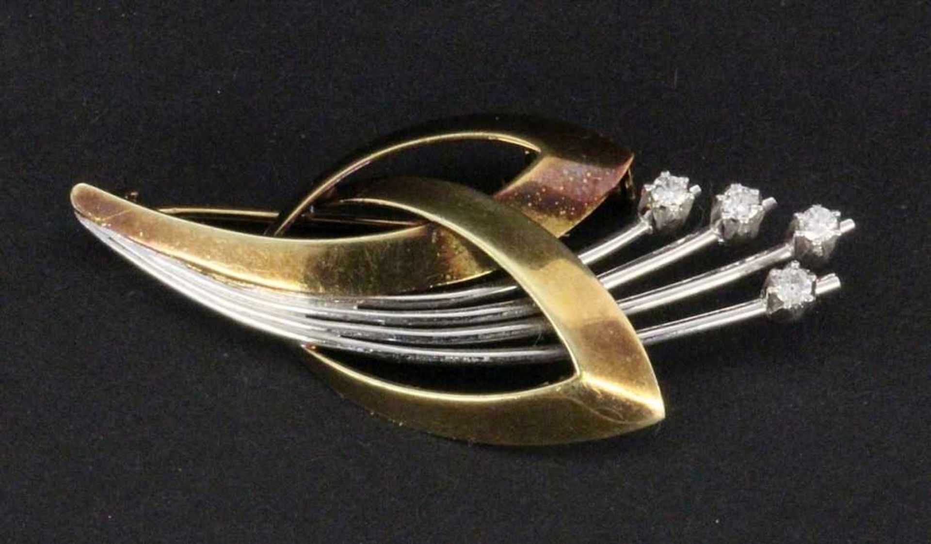 ''A BROOCH 585/000 yellow and white gold with 4 brilliant cut diamonds, totalling