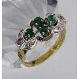 ''A LADIES RING 585/000 yellow gold with 4 emeralds and brilliant cut diamonds. Ring size