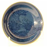 ''A BOWL Japan. Porcelain with blue glaze and a samurai painted under the glaze. Diameter