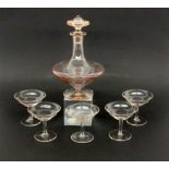 ''A LIQUEUR SET Moser, Karlsbad. Carafe with 5 goblets made of delicate pink glass. Partly