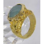 ''A LADIES RING Silver gilt with opaque aquamarine. Ring size 54, gross weight approx. 12