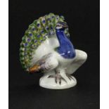 ''A PEACOCK Meissen, 20th century Polychrome painted miniature figure. Model number 77170,