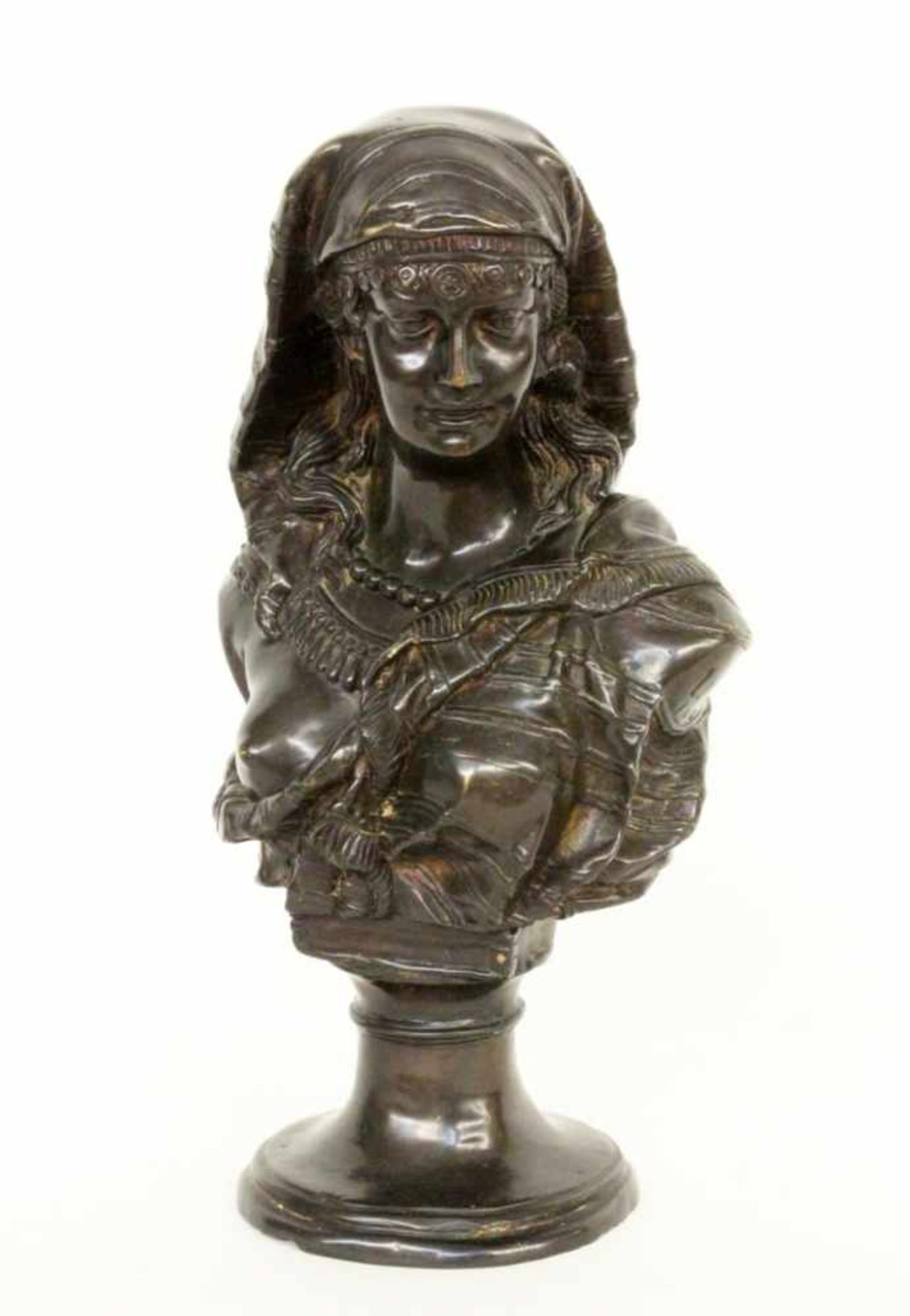A BUST OF AN ORIENTAL WOMAN probably France circa 1800 Patinated bronze bust.