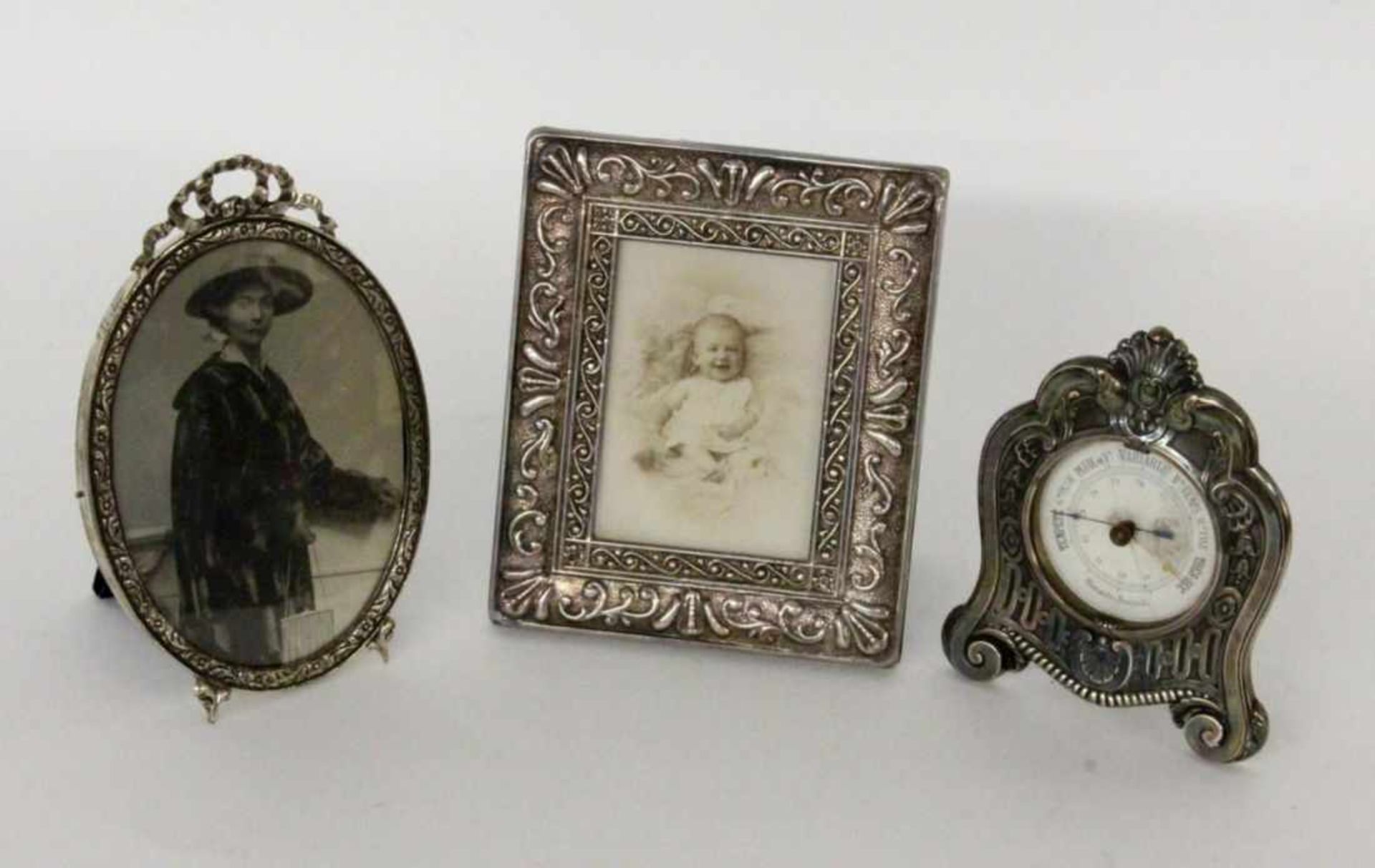 ''A LOT OF SILVER ITEMS Thermometer (glass damaged) and 2 photograph framesKeywords: