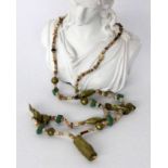 ''A NECKLACE FROM PERU Brass and shell trimKeywords: jewellery, jewelry''