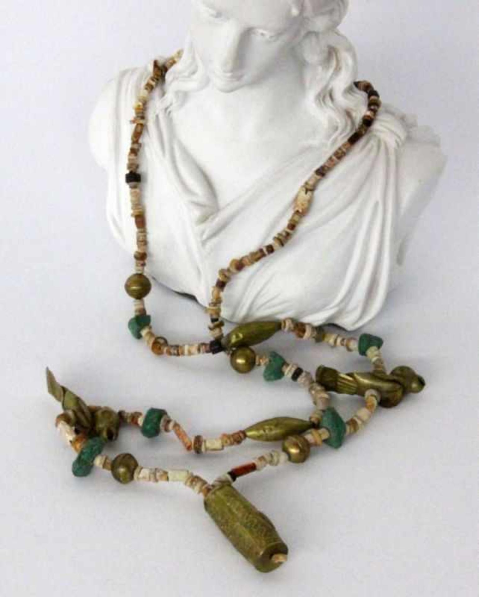 ''A NECKLACE FROM PERU Brass and shell trimKeywords: jewellery, jewelry''