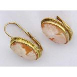 ''A PAIR OF DROP EARRINGS WITH SHELL CAMEOS Silver gilt. 28 mm long.Keywords: jewellery,