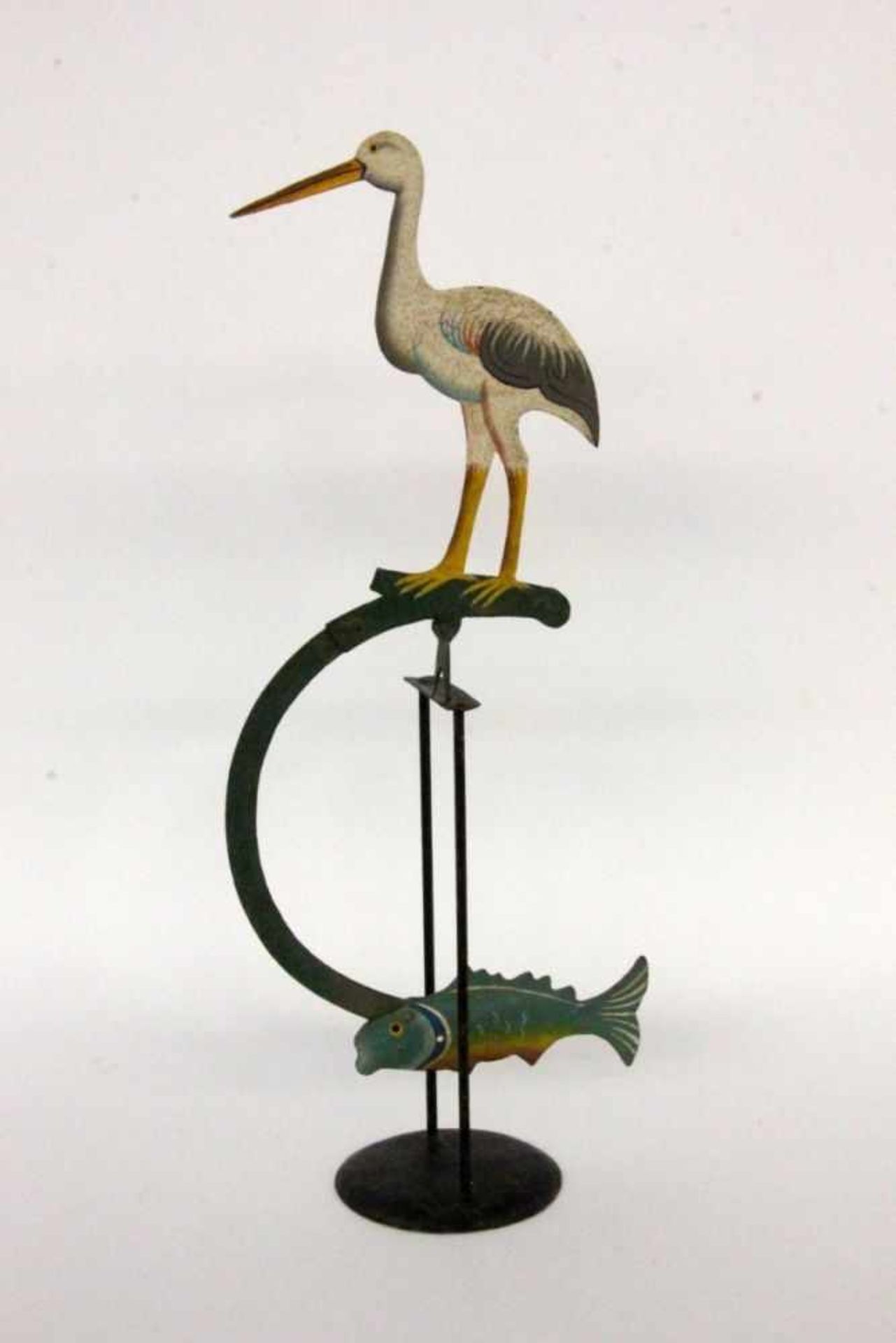 A BOBBING STORK Sheet metal with colourful painting. 51 cm high