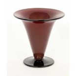 ''AN ART DECO VASE circa 1925 Funnel shape. Wine-red glass with a black lip and black base.