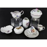 ''A LOT OF 8 LUDWIGSBURG PORCELAIN ITEMS Neu-Ludwigsburg. Painted in colour. Maker's