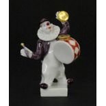 ''A CLOWN WITH DRUM Meissen, 20th century Polychrome painted miniature figure. Design by