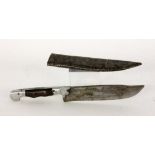 ''AN OLD DAGGER Single-edged steel blade with handle made from wood and metal. In metal