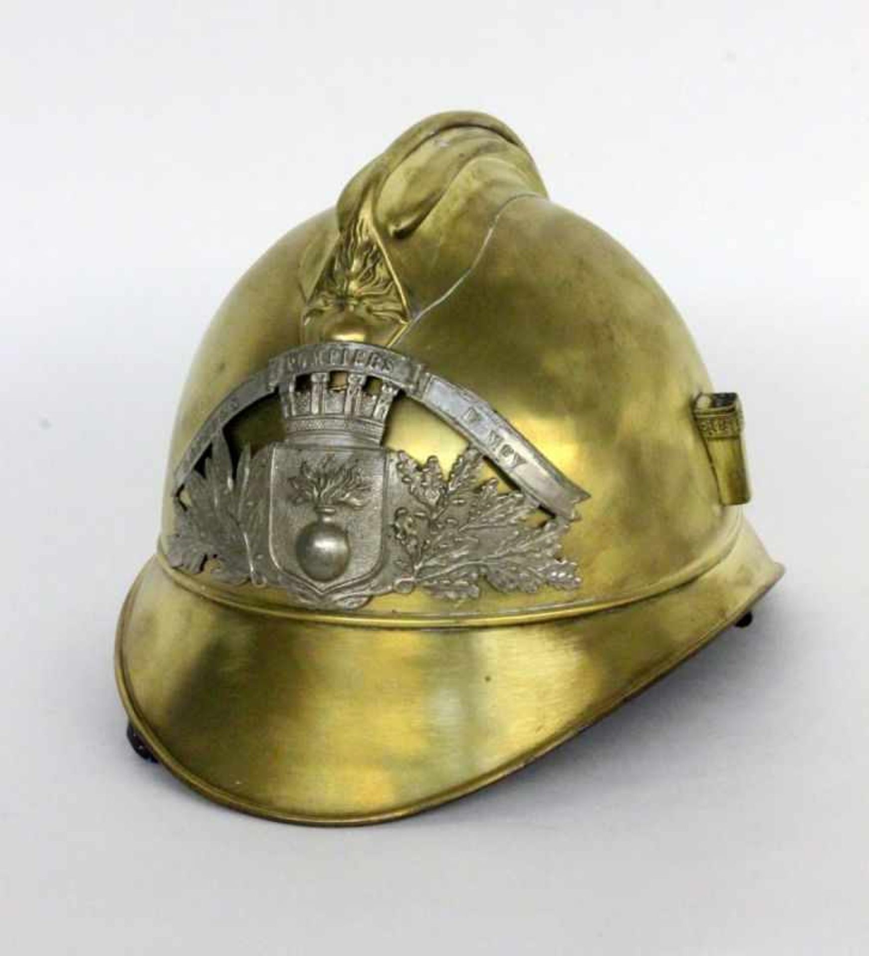 ''A FRENCH FIREMAN'S HELMET Brass with leather insert. Inscribed: ''Sapeurs Pompiers de
