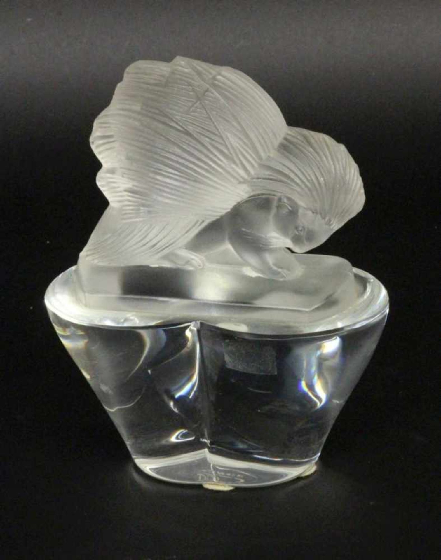 ''A PAPERWEIGHT, crystal glass in the shape of an animal. Signed: Sevres France. 15 cm