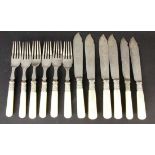 ''A SET OF FISH KNIVES AND FORKS, 12 pieces for 6 persons. Silver-plated metal with